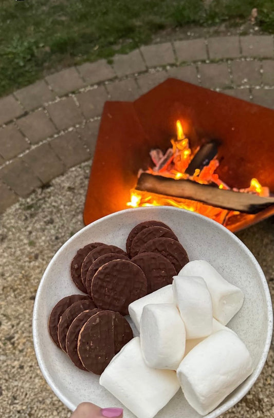 Jumbo marshmallows and digestive biscuits make a delicious campfire treat